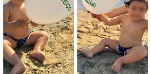bimbo con palloncino, spiaggia, mare